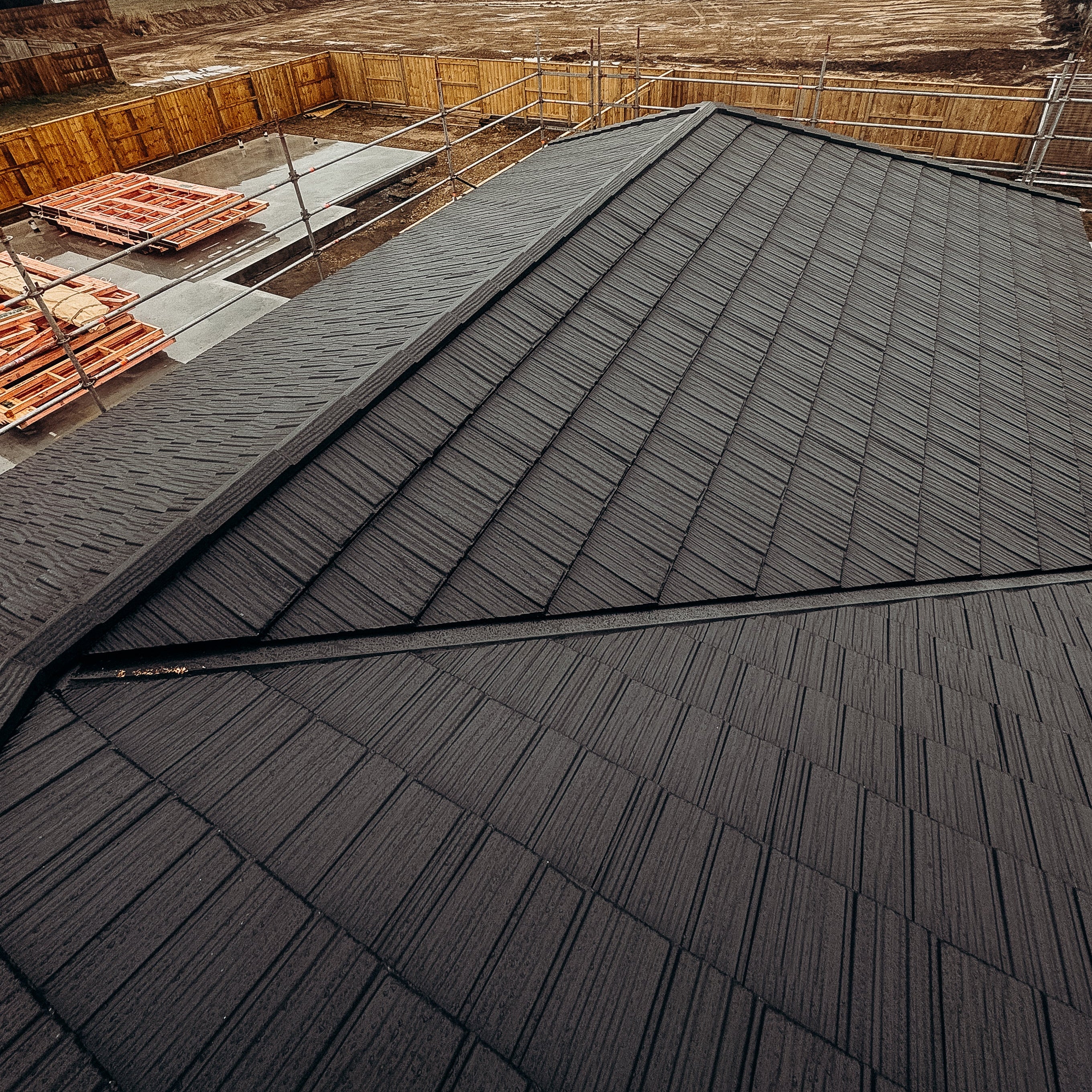 Completed Gerard Roofing Tile installation in Windor Grey for Jennian Homes. A sleek, modern metal tile roof engineered for strength, weatherproofing, and architectural excellence.