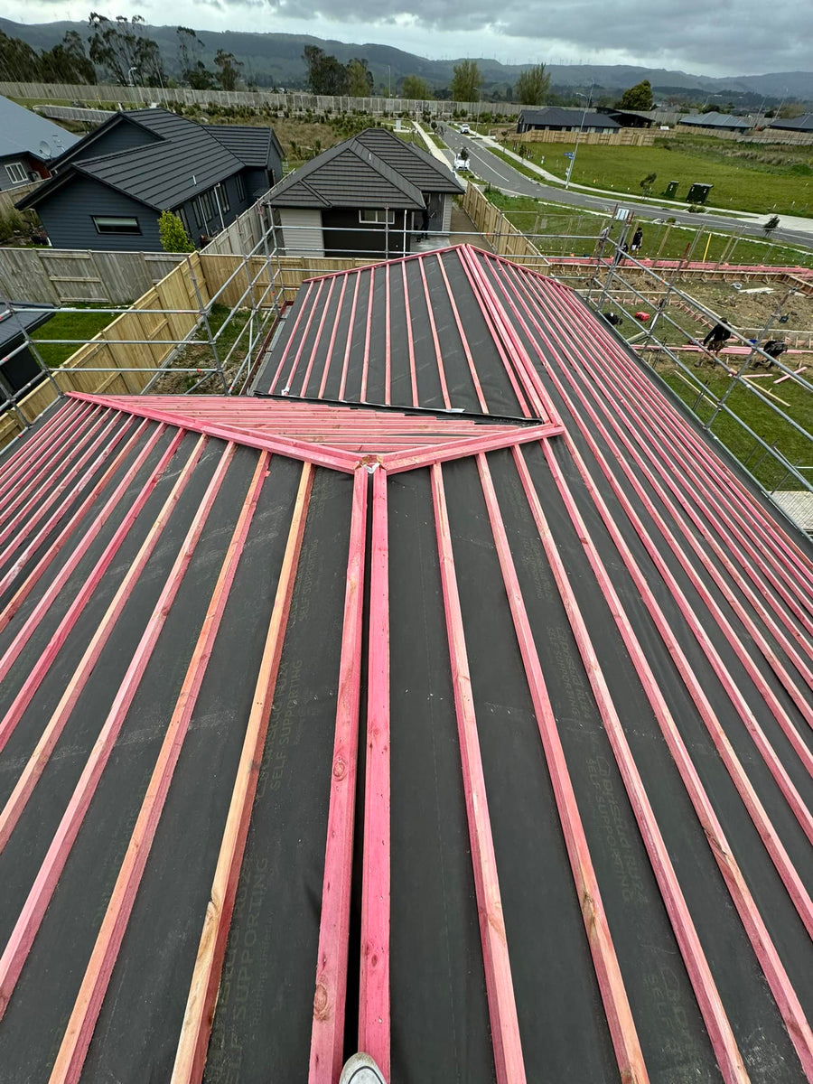 Roof stripped back to the battens, ready for new longrun