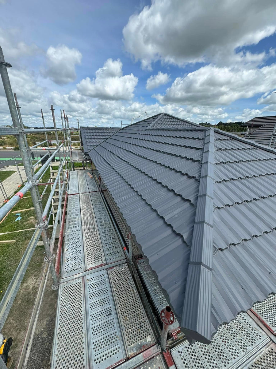 Metal tile roof on a new build, nearing completion