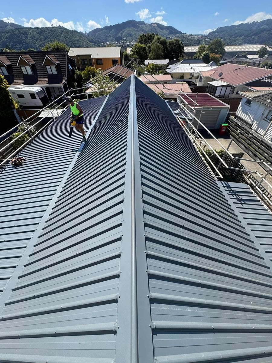 Installing grey longrun on a hip roof