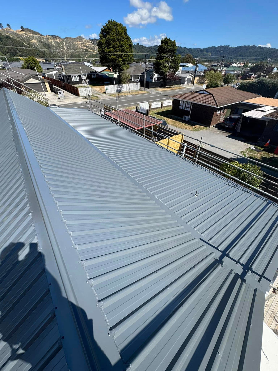 Grey longrun with ridge capping